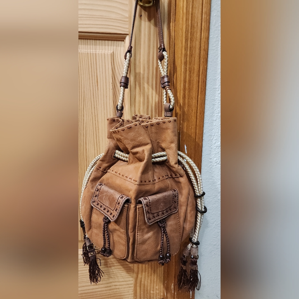Women's hobo style bag by "the Sak"